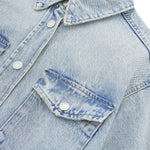 Vestido midi vaquero sin mangas con botones y aberturas en la parte delantera