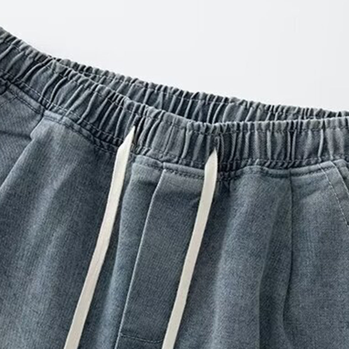 Bermudas vaqueras rasgadas con parches de camuflaje