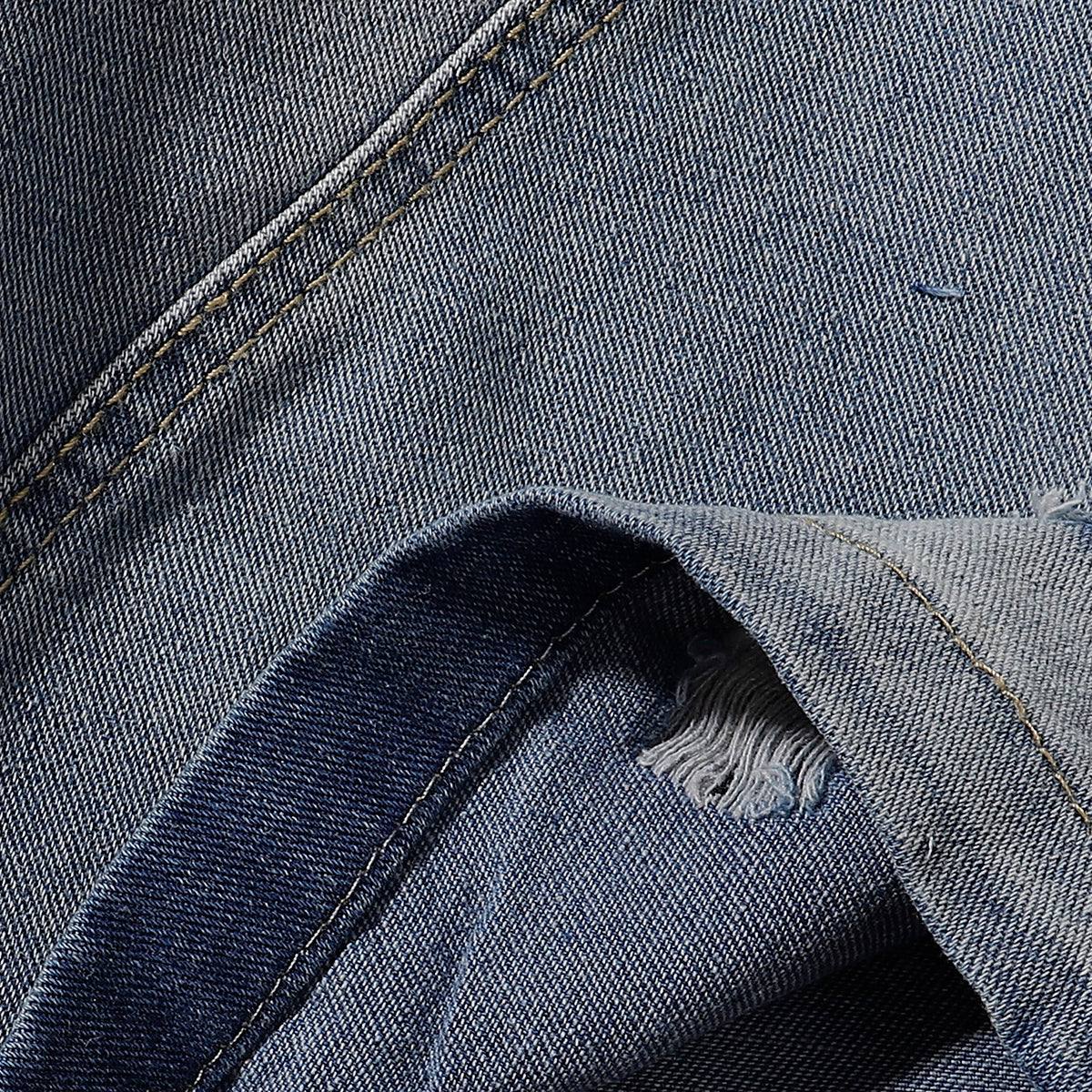 Bermudas vaqueras rasgadas con parches de camuflaje