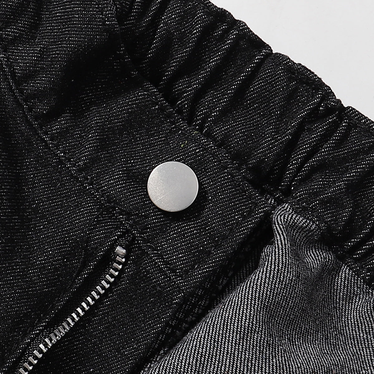 Bermudas vaqueras rasgadas con parches de camuflaje