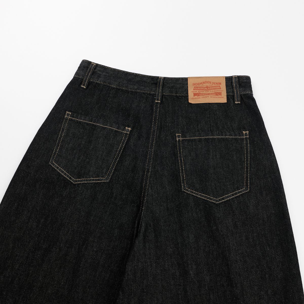 Creased Raw Denim Straight‑Leg Jeans
