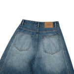 Vintage Blue Wide‑Leg Jeans With Side Pleat Details