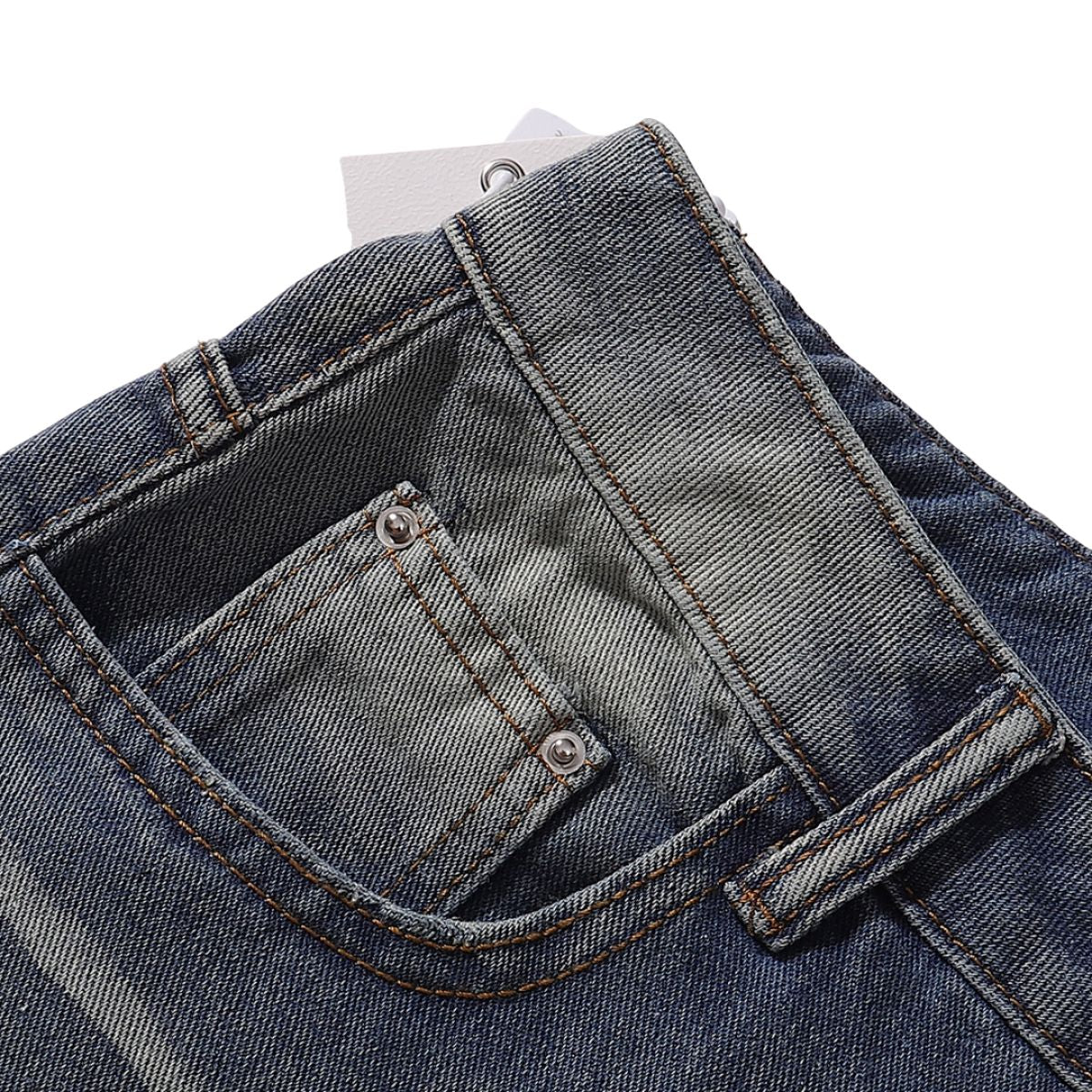 Bermudas con lavado vintage y salpicaduras de tinta