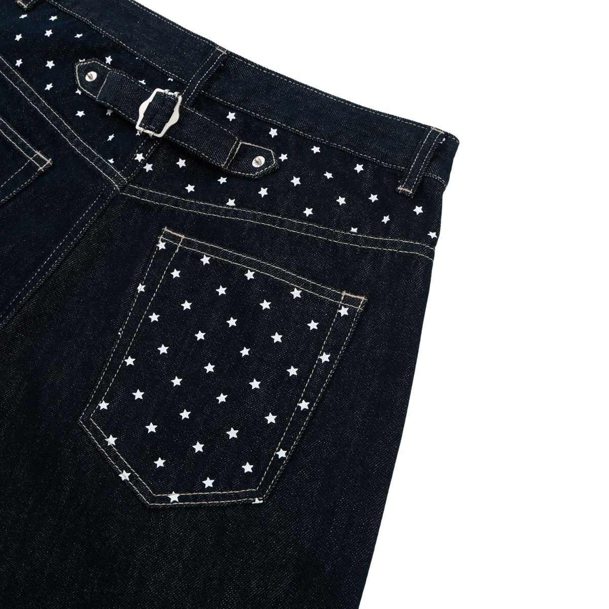 Star‑Print Curved Blade Raw Denim Jeans