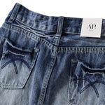 Falda vaquera con bordado de perlas y lavado vintage