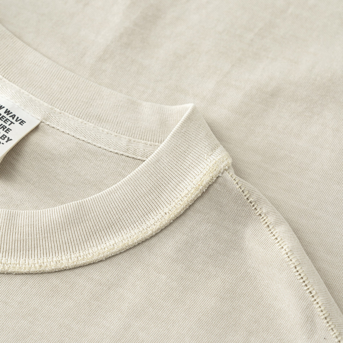 Camiseta sin mangas con borde reverso sin rematar de 8 oz