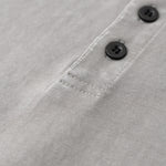 Polo lavado de color en contraste de 8.5 oz