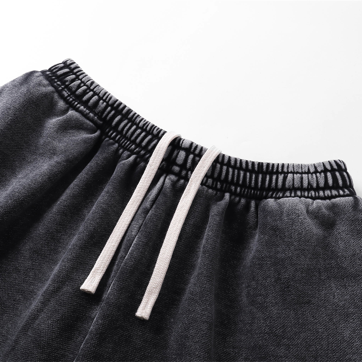 Pantalones cortos desgastados con lavado a la piedra