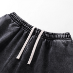 Pantalones cortos desgastados con lavado a la piedra