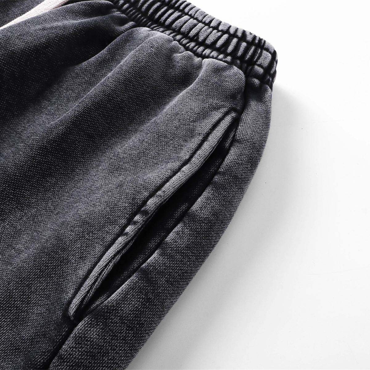 Pantalones cortos desgastados con lavado a la piedra