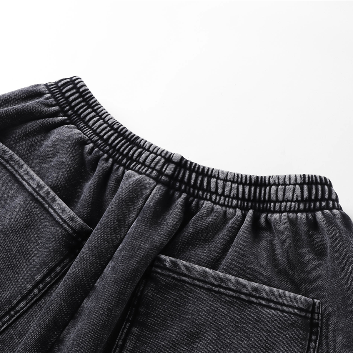 Pantalones cortos desgastados con lavado a la piedra