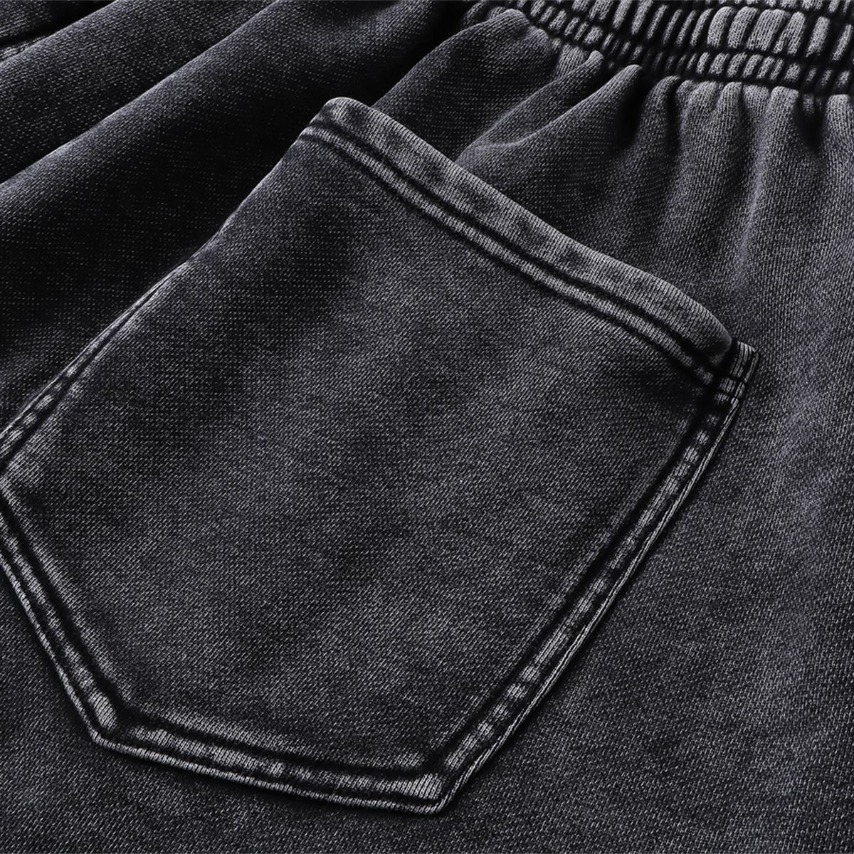 Pantalones cortos desgastados con lavado a la piedra