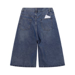 Bermudas vaqueras rasgadas con parches de camuflaje