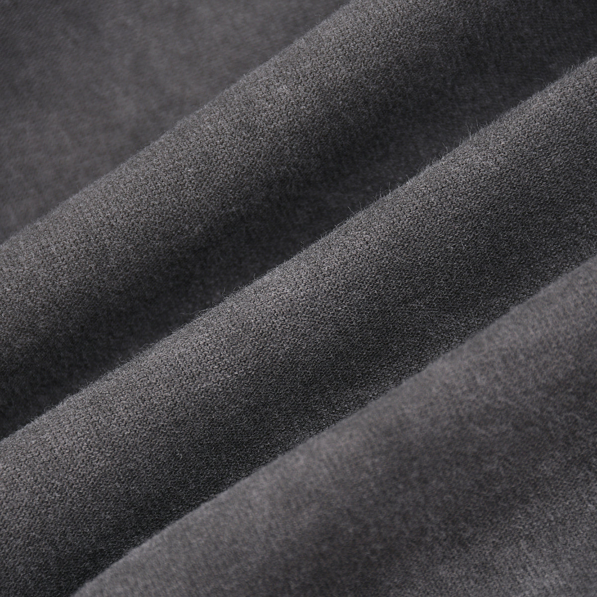 Camiseta sin mangas con borde sin rematar y costura trasera de 7.5 oz