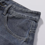 Bermudas vaqueras rasgadas con parches de camuflaje