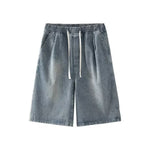 Bermudas vaqueras rasgadas con parches de camuflaje