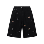 Bermudas vaqueras rasgadas con parches de camuflaje