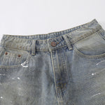 Bermudas con lavado vintage y salpicaduras de tinta