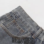 Bermudas vaqueras rasgadas con parches de camuflaje