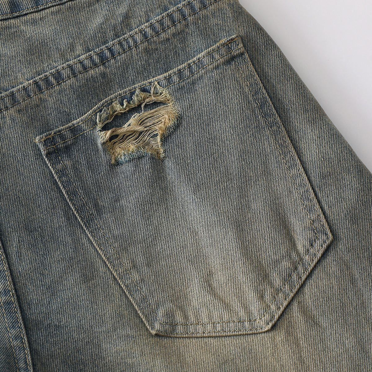 Panel Stitching Barrel-Leg Ripped Jeans