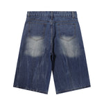 Bermudas vaqueras rasgadas con parches de camuflaje