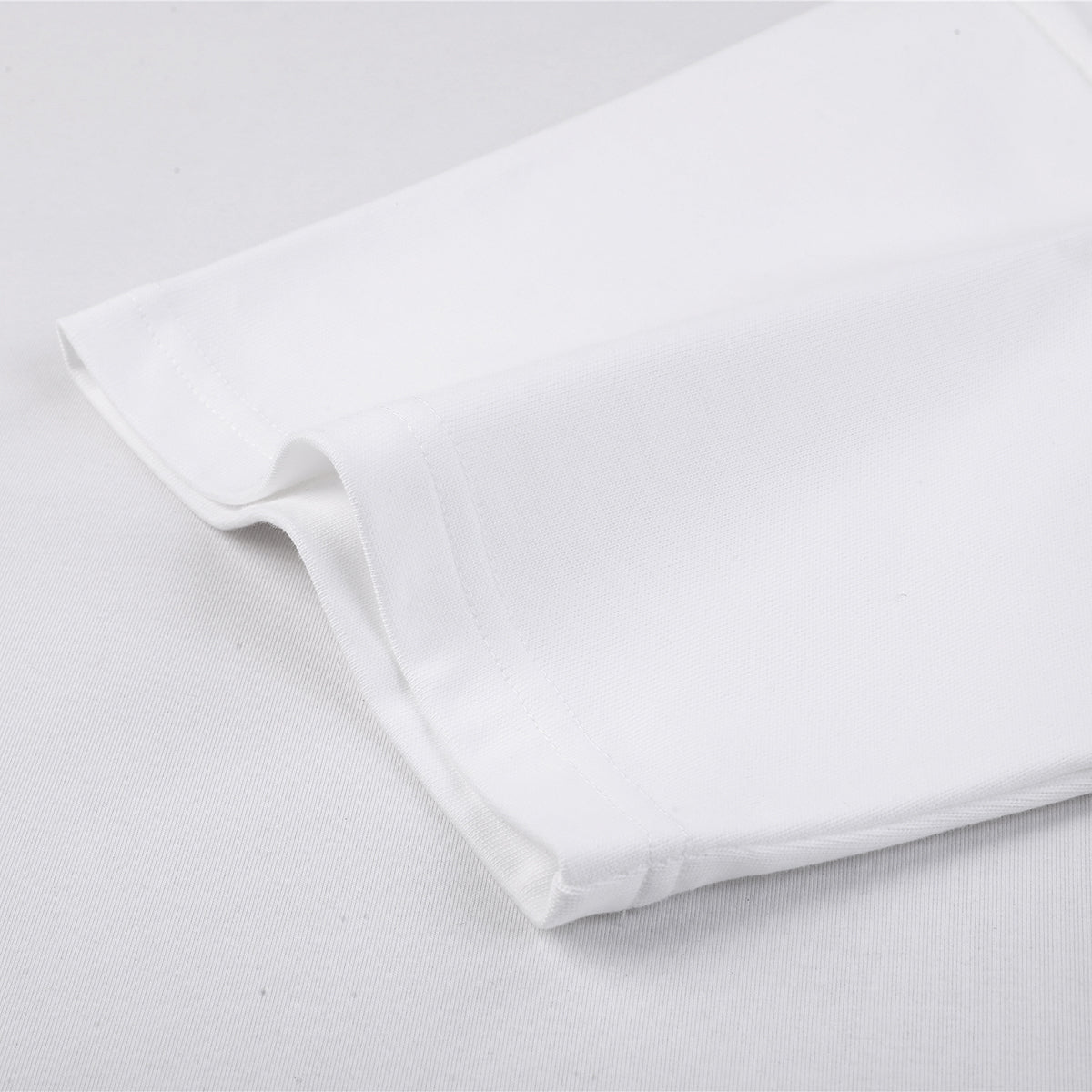 Camiseta de algodón de color liso y corte relajado de 6,6 oz